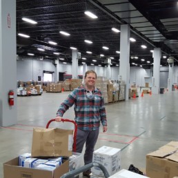 Portal Instruments - man standing in warehouse
